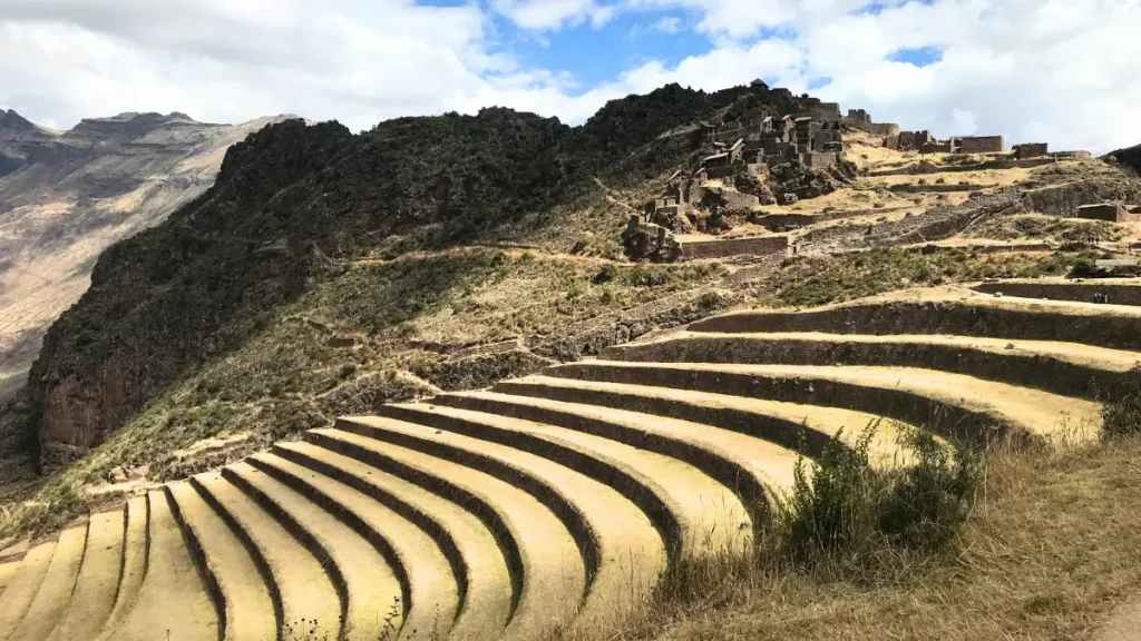 Ancient Inca agricultural terraces built into the Andes Mountains in Peru, showcasing the advanced engineering and farming techniques of early Andean civilizations.