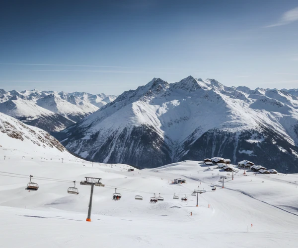 “High-altitude ski resort in the European Alps with strong snow coverage and active ski lifts during winter 2025.”